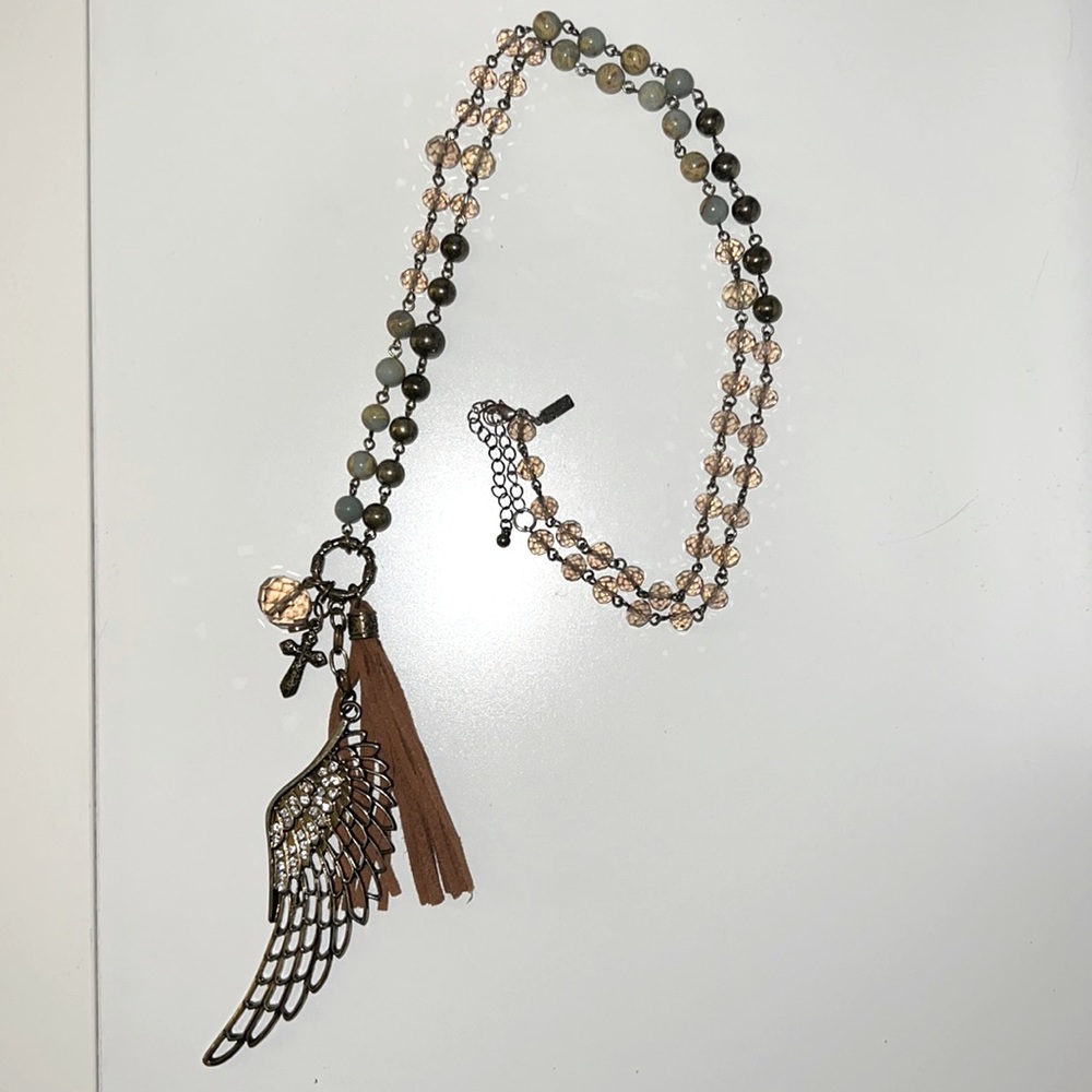 Long beaded wing charm necklace